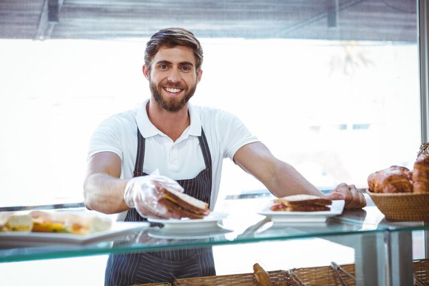  Happy server showing sandwich 