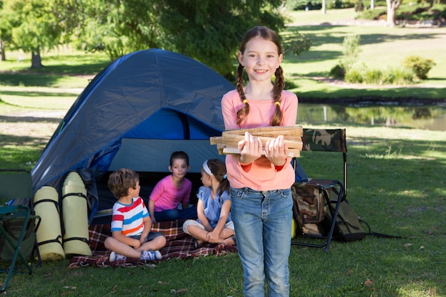 Happy siblings on a camping trip