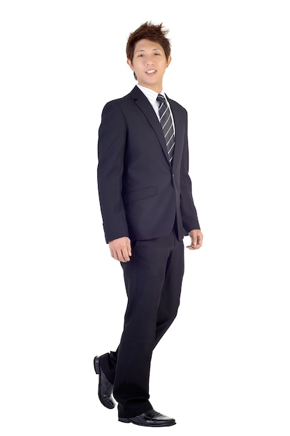 Happy smiling business man walking with smiling expression, full length portrait isolated over white wall.