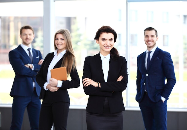 Happy smiling business team in office