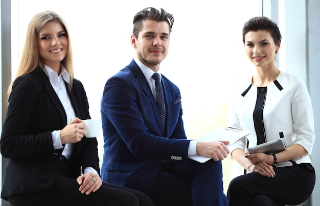 Happy smiling business team in office