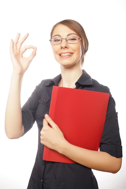 Happy smiling business woman with okay gesture