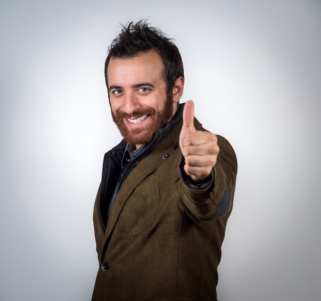 Happy smiling Man Showing Thumb Up Sign