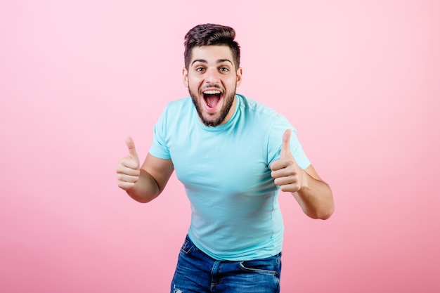 Happy smiling middle eastern man showing thumbs up