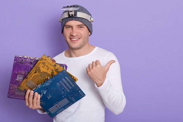 Happy smiling radiotrician wears casual outfit with magnifier on her forehead