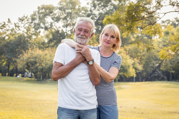 Happy smiling of senior couple in a park on a holiday.