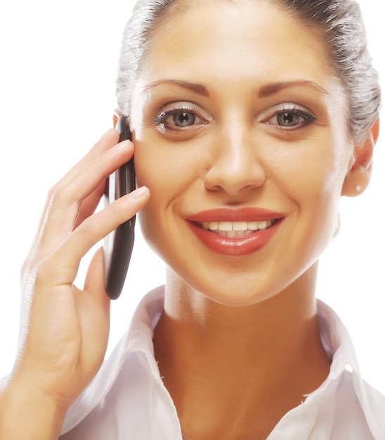 Happy smiling successful businesswoman with cell phone