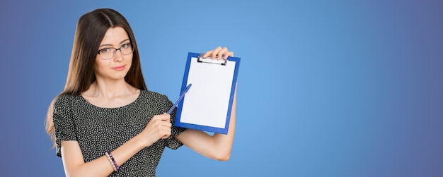 Happy smiling young beautiful business woman with clipboard