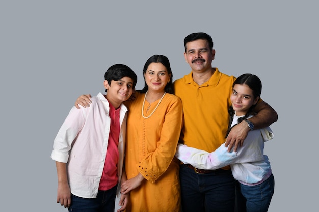 happy smiling young family are hugging indian pakistani model