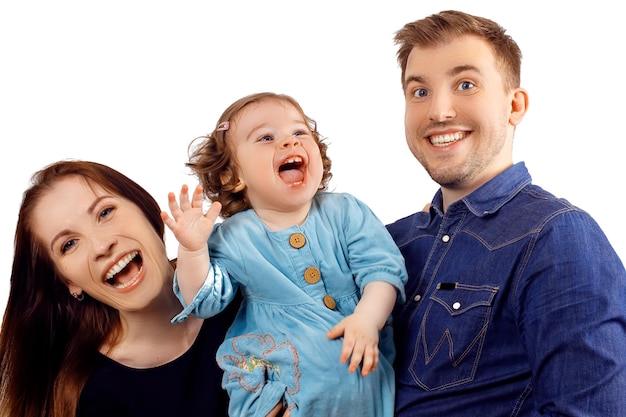 Happy and smiling young family portrait isolated on white background father and mother with little b