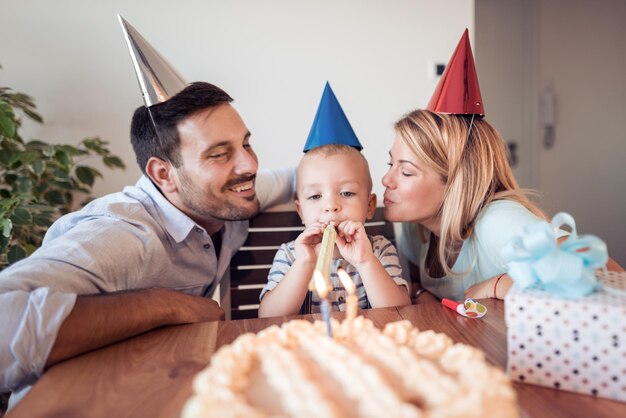 Happy son on his birthday's day with his family