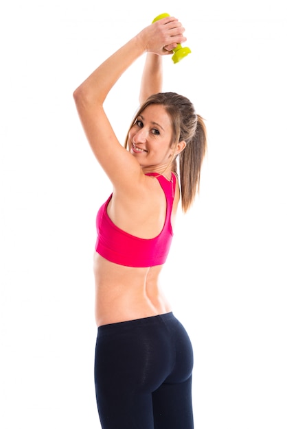 Happy sport woman doing weightlifting