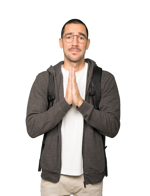 Happy student praying gesture