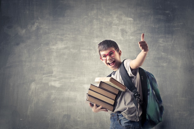 Happy student with books