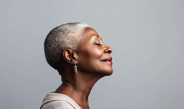 Happy and Stylish Senior African American Woman with Short Grey Hair with copy space