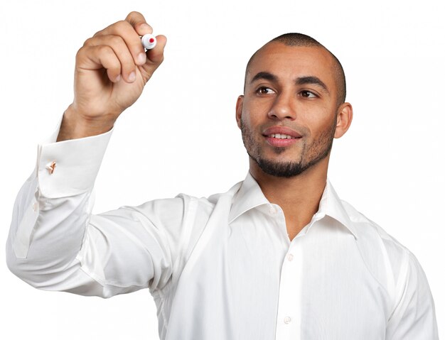 Happy successful businessman pointing on copy space