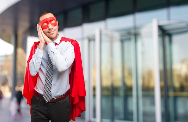 Happy super businessman sleeping