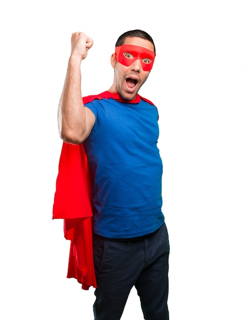 Happy superhero celebrating