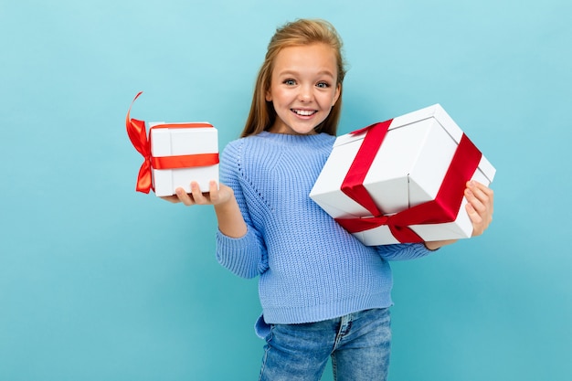 Happy surprised shocked girl with two boxes of gifts