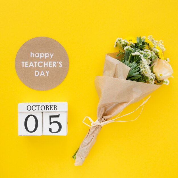 Happy teacher's day concept with flowers