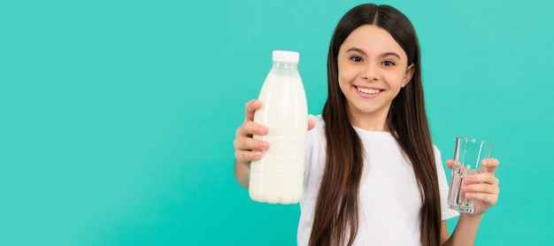 Photo happy teen girl going to drink glass of milk or yoghurt milk horizontal poster of isolated child