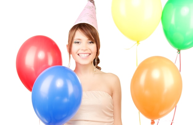 happy teenage party girl with balloons