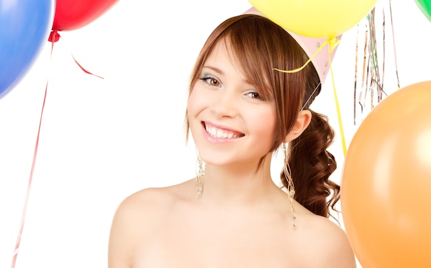 happy teenage party girl with balloons