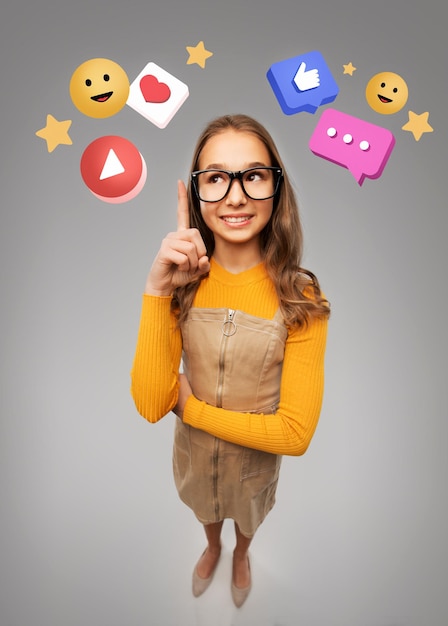 happy teenage student girl showing internet icons