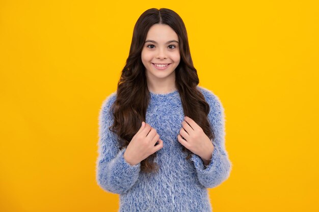 Happy teenager positive and smiling emotions of teen girl pretty teenage girl in studio child girl portrait