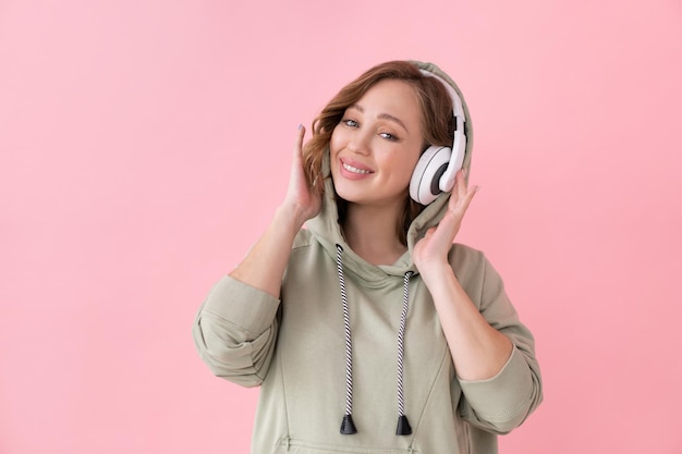 Happy teeth smile woman listen music headphones