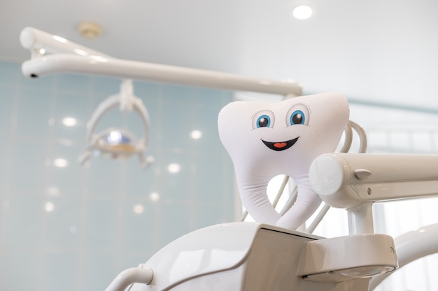 Happy tooth model in dentist clinic