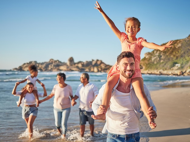 Happy travel and love with big family at beach for Colombia holiday for summer relax and support Sunset nature and smile with parents kids and grandparents walking by the sea for vacation