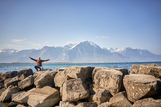 happy ugly man at switzerland lake leman