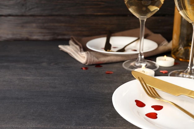 Happy Valentine day composition on dark wooden table