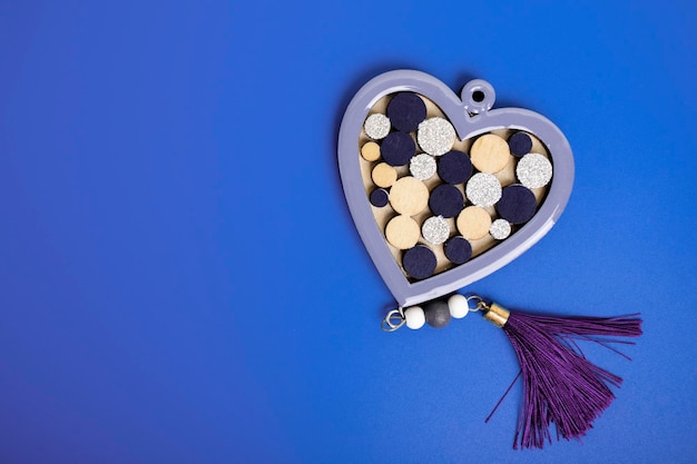 Happy Valentine's Day on February 14 Heart on a blue background with copy space