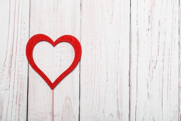 Happy Valentine's day hearts on wooden table. Valentine card