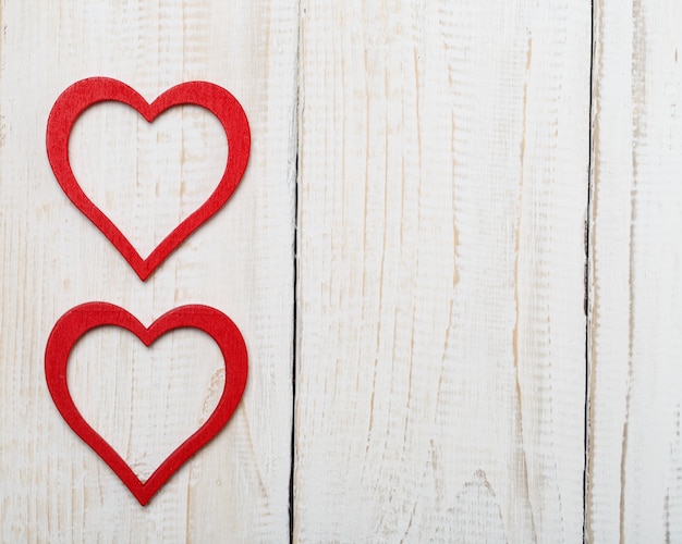 Happy Valentine's day hearts on wooden table. Valentine card