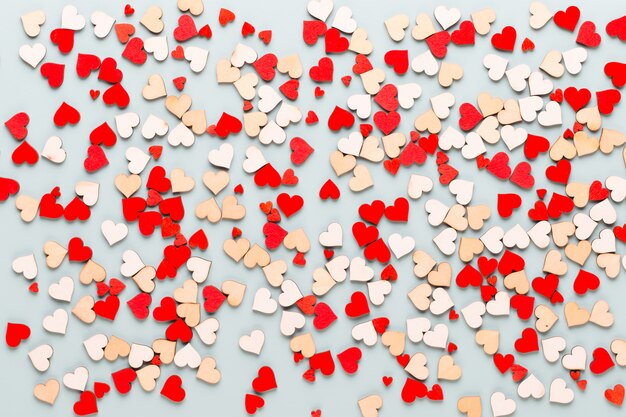 Happy Valentines day background. With small hearts on pastel background.