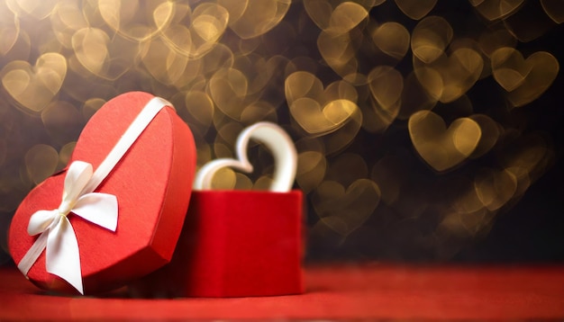 Happy valentines day concept with red gift box and heart shape background Valentine's scene with a r