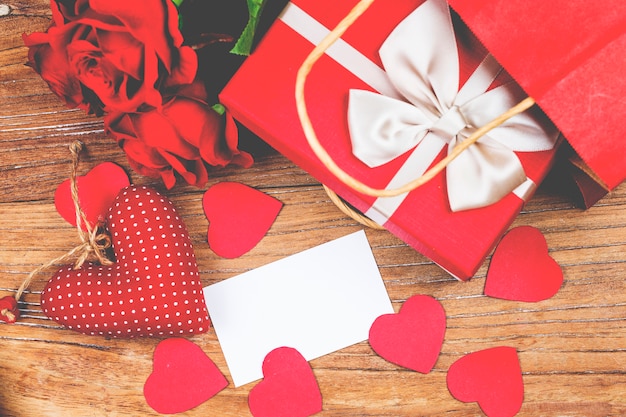 Happy Valentines day and heart. Card with Happy Valentines day and heart on wooden background