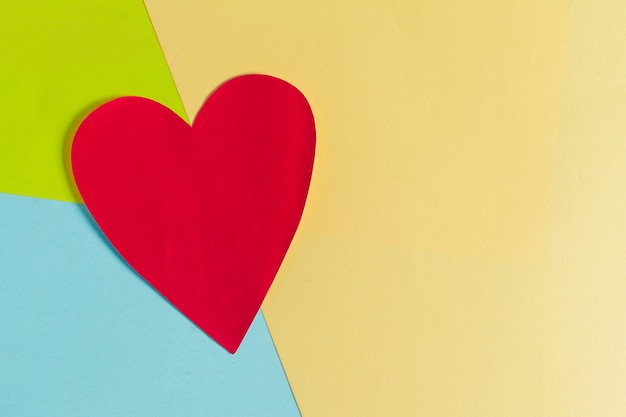 Happy valentines day with heart on colorful papers