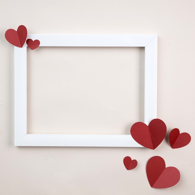 Photo happy valentines day with paper red heart and white horizontal frame