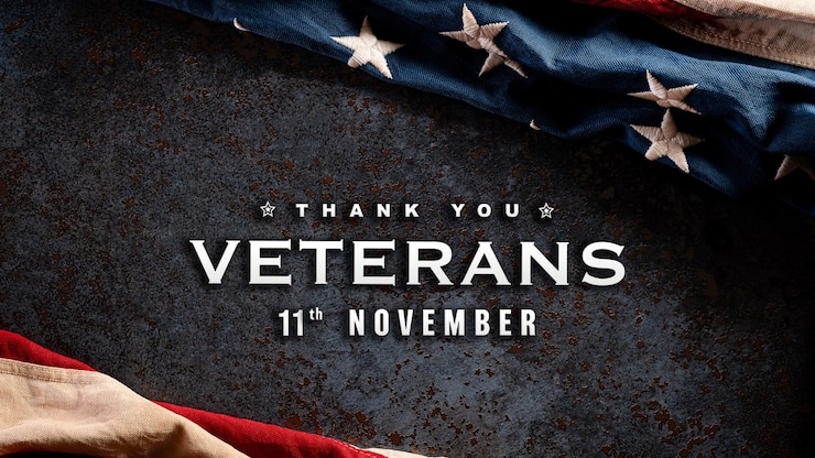 Photo happy veterans day concept. american flags against a dark stone background
