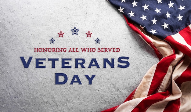 Happy Veterans day concept made from American flag and the text on dark stone background