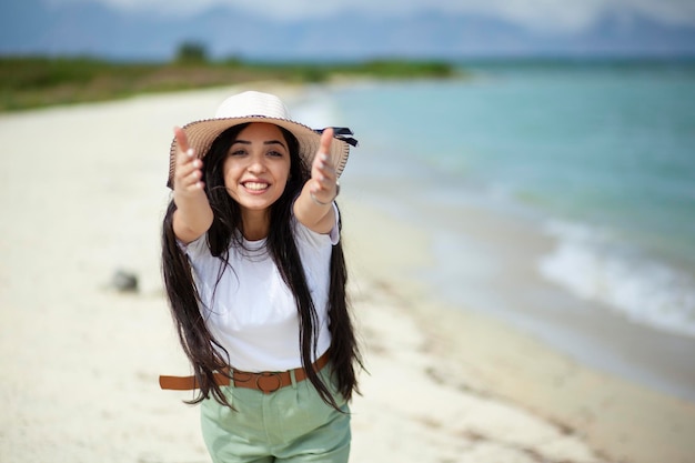 Happy woman in the beach