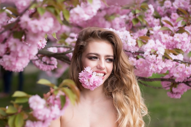 Happy woman in blossom