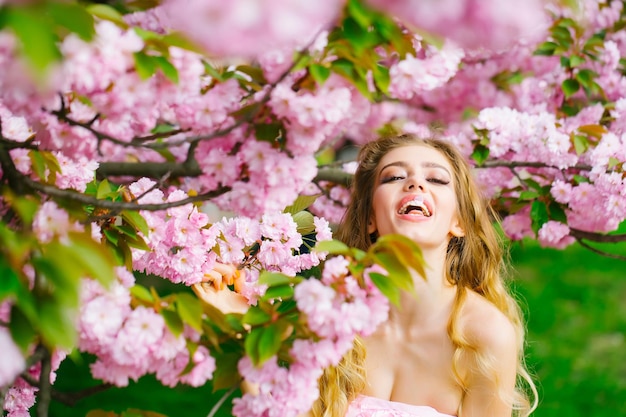 Happy woman in blossom