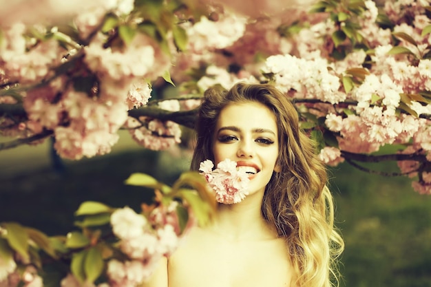 Happy woman in blossom