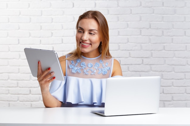 Happy woman doing online shopping at home