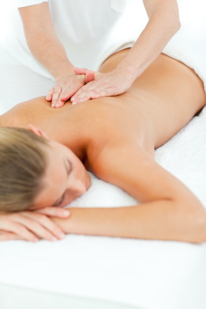 Happy woman enjoying a massage